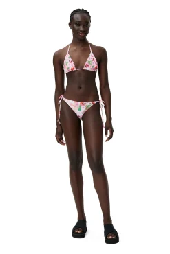 Shop GANNI Bedruckte String-Bikinihose Sugar Plum