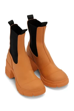 Shop GANNI Hohe City-Stiefel Aus Rubber Vibrant Orange